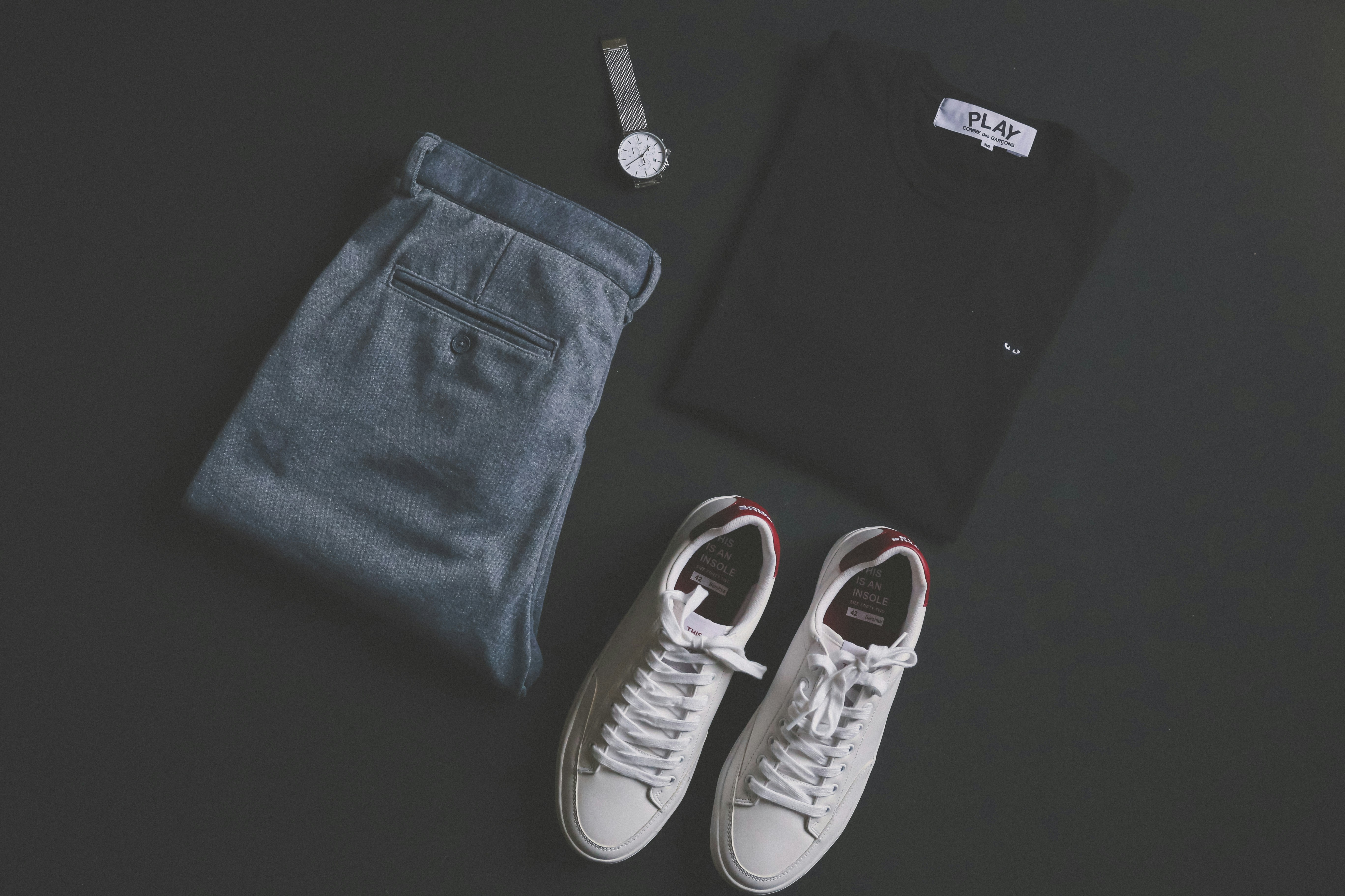 A flat-lay of curated wardrobe pieces.